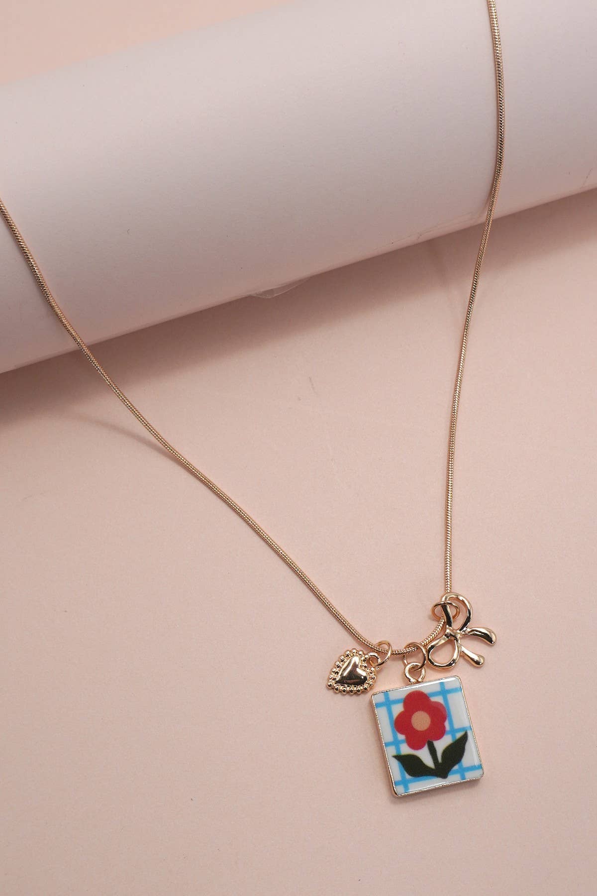PORCELAIN CLUSTER CHARM BOW HEART NECKLACE