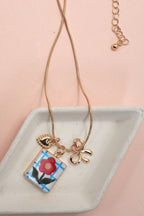 PORCELAIN CLUSTER CHARM BOW HEART NECKLACE