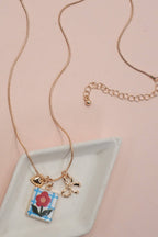 PORCELAIN CLUSTER CHARM BOW HEART NECKLACE