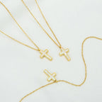 WHITE JEWELD CROSS NECKLACE